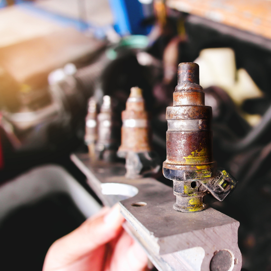 Close up of old broken gas injectors of the LPG gas fuel system